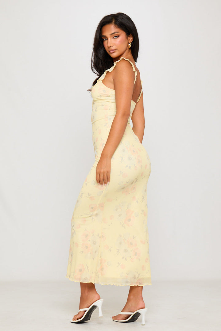 Gelbes Maxi-Slipkleid mit Blumenmuster und Rüschendetail